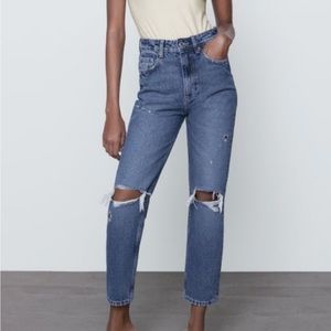 Medium wash straight leg Zara jeans.